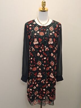 CeCe black shift dress with red, blush pink, and cream floral embroidery and she